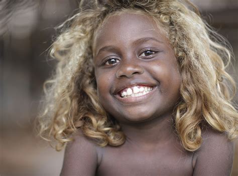 solomon islanders melanesian blonde hair blue eyes|More.